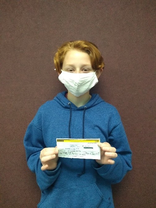 M. Campbell with fundraiser check