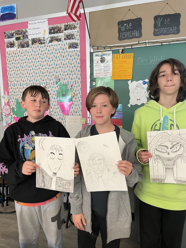 The 6th graders created self-portraits in the style of Tim Burton.