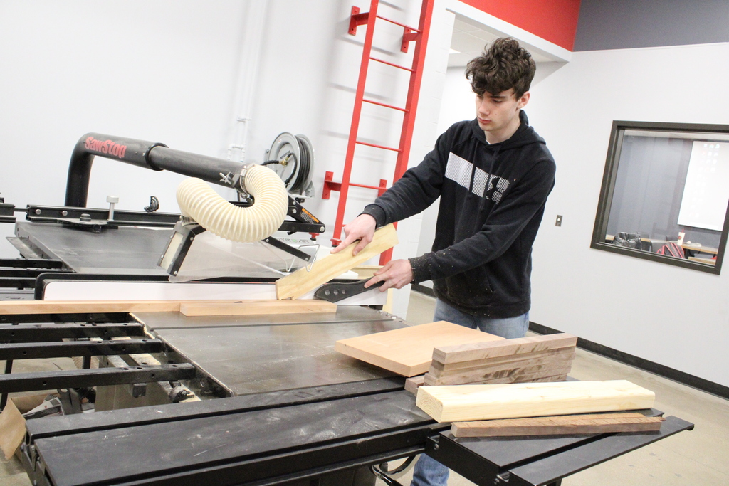 CHS Student working with wood.